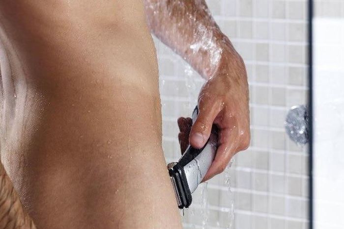 Gentleman grooming his pubic region