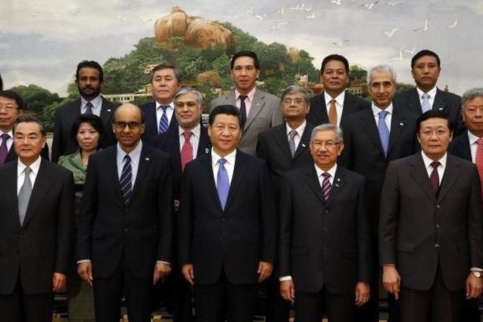 Chinese President Xi Jinping with delegates at the signing ceremony of the Asian Infrastructure Investment Bank in Beijing in October 2014.