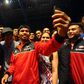 Manny Pacquiao taking a selfie with fans and team before the fight