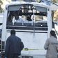 Tunisian forensics police inspect a Tunisian presidential guard bus at the scene of a suicide bomb attack in Tunis, Tunisia November 25, 2015. REUTERS/Zoubeir Souissi