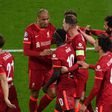 Liverpool players celebrate against Atletico Madrid