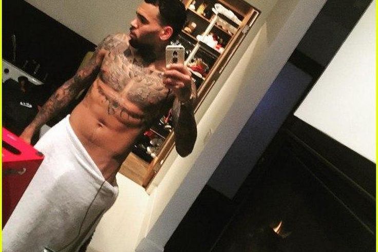 Chris Brown in towel on New Year's Eve