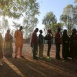 People queue to vote during the presidential and legislative election at a polling station in Ouagadougou, Burkina Faso, November 29, 2015.
