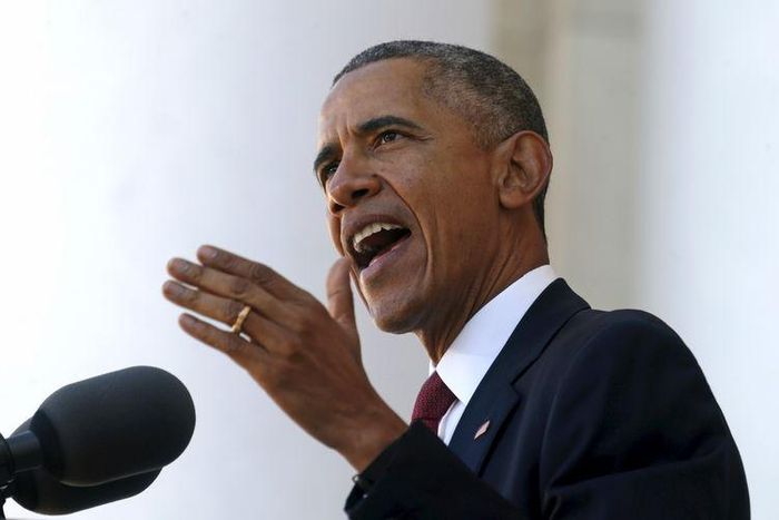 U.S. President Barack Obama speaks during a Veterans Day ceremony at Arlington National Cemetery in Virginia, November 11, 2015. REUTERS/Kevin Lamarque