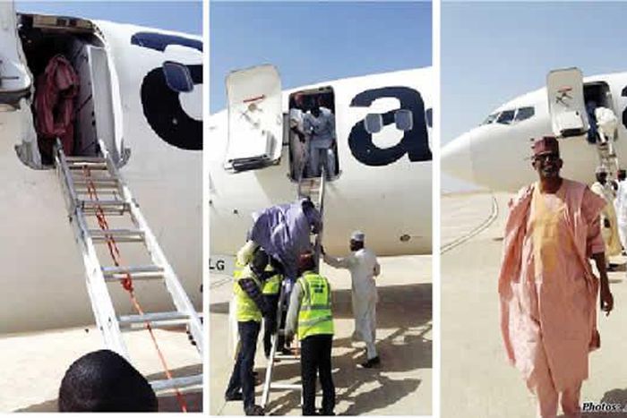 Picture of airline passengers disembarking from an aircraft using a ladder, at the Bauchi Airport.