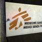 A sign is pictured over a black sheet outside the Medecins Sans Frontieres (MSF) headquarters in Geneva, Switzerland October 7, 2015. REUTERS/Denis Balibouse