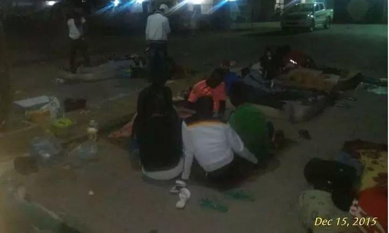 Taraba United players sleeping in front with the State Government House
