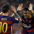 Barcelona"s Lionel Messi (L) celebrates with team Neymar after scoring a goal against Atletico Madrid during their Spanish first division soccer match at Vicente Calderon stadium in Madrid,12 September, 2015.