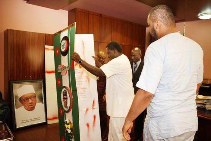 Raymond Dokpesi Jnr presents greeting cards to presidential aide, Femi Adesina