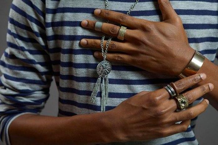 Denola Grey wearing a silver necklace