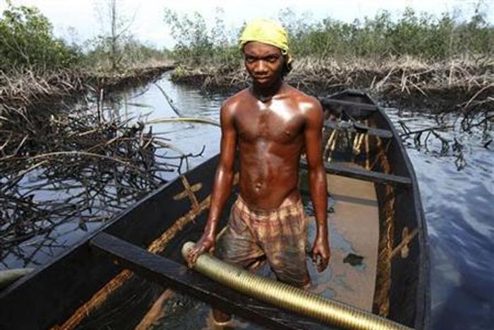 A Niger-Delta fisherman in the creeks