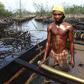A Niger-Delta fisherman in the creeks