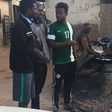Ogenyi Onazi buying roadside 'Akara' in Jos
