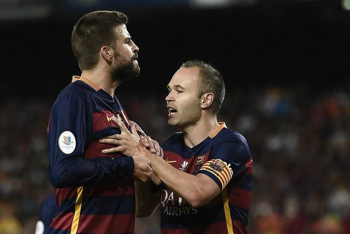 Gerard Pique and Andres Iniesta