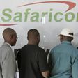 Kenyans line up outside a Safaricom building in a file photo. REUTERS/Antony Njuguna