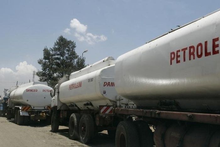 Trucks transporting oil, petrol and gas wait to reload outside a depot in the outskirts of Nairobi September 30, 2008.   REUTERS/Antony Njuguna