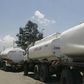Trucks transporting oil, petrol and gas wait to reload outside a depot in the outskirts of Nairobi September 30, 2008. REUTERS/Antony Njuguna (KENYA)