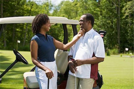 Couple playing sports [Masterfile]