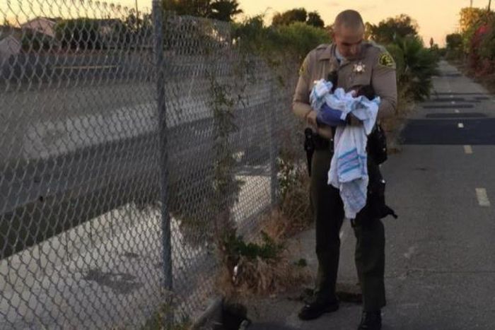 Newborn baby buried alive under road construction bitumen