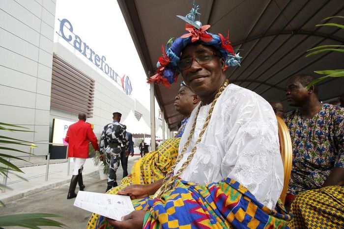 A local traditional chief is seen at the PLAYCE mall housing the French supermarket Carrefour after its inauguration by Ivory Coast's President Alassane Ouattara in Abidjan, Ivory Coast, December 18, 2015. REUTERS/Thierry Gouegnon