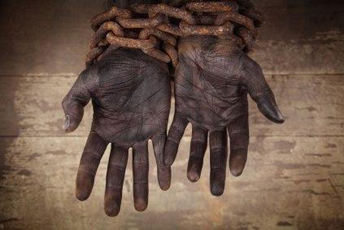 ___4112768___https:______static.pulse.com.gh___webservice___escenic___binary___4112768___2015___8___28___9___Slave-Hands-Chained-Does-the-Bible-Condone-Slavery