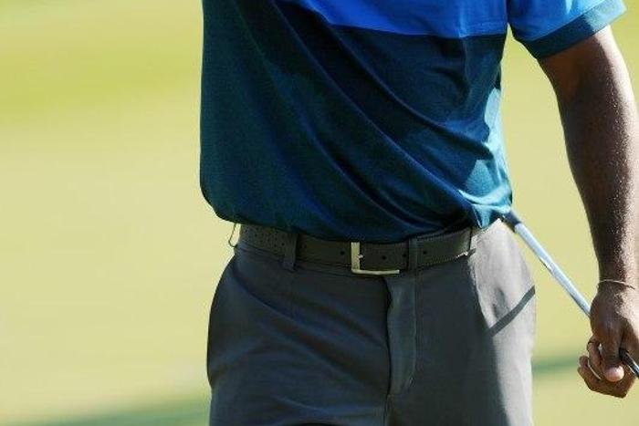Aug 15, 2015; Sheboygan, WI, USA;  Tiger Woods walks off the 18th hole during the second round of the 2015 PGA Championship golf tournament at Whistling Straits. Mandatory Credit: Thomas J. Russo-USA TODAY Sports