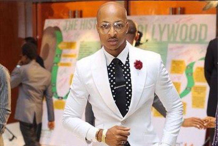 Ik Ogbonna in a black and white ensemble