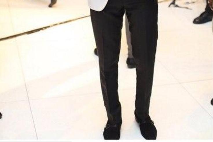 Ik Ogbonna in a black and white ensemble