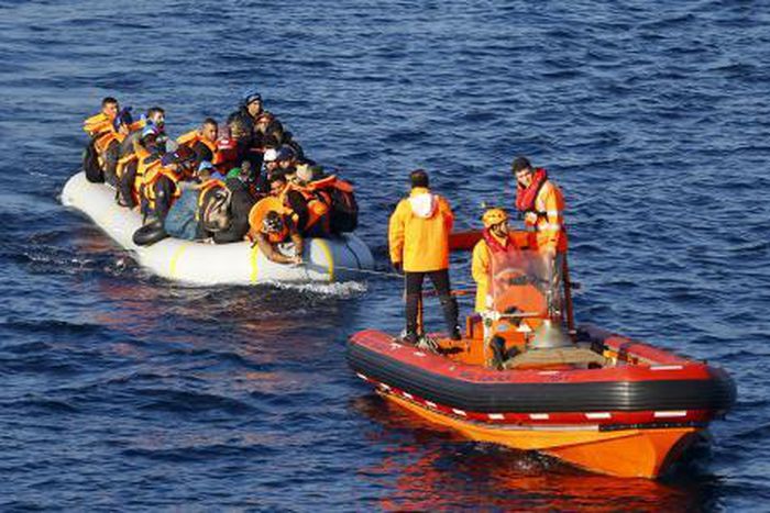 A Turkish Coast Guard fast rigid-hulled inflatable boats tow refugees and migrants in a dinghy on the Turkish territorial waters of the North Eagean Sea, following a failed attempt of crossing to the Greek island of Lesbos, off the shores of Canakkale,...