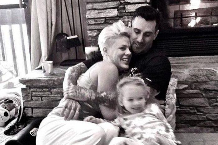 The 40-yr-old retired motocross racer posted a black and white photo of his family on Instagram as he wished his 36-yr-old wife a happy wedding anniversary
