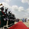 Niger"s President Mahamadou Issoufou inspects the guard of honour upon arrival at the airport in Abuja, Nigeria May 28, 2015.
