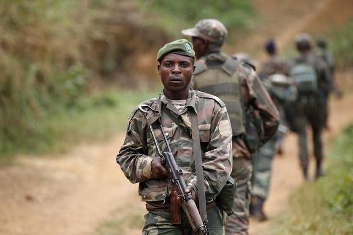 Democratic Republic of Congo military (FARDC) personnel patrol against the Allied Democratic Forces (ADF) and the National Army for the Liberation of Uganda (NALU) rebels near Beni in North-Kivu province, December 31, 2013. REUTERS/Kenny Katombe