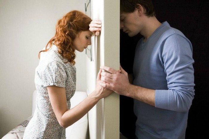 Couple holding hands