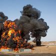 Four oil tanks on fire at Libyan ports after clashes with terrorists