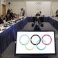 International Olympic Committee President Jacques Rogge and members of the IOC talk prior to the beginning of the IOC executive board meeting at the SportAccord convention at the Congress Center in Quebec City, in a file photo. REUTERS/Mathieu Belanger