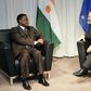 Javier Solana listens to Niger's former Prime Minister Seyni Oumarou (L) at the EU Council in Brussels, in a file photo. REUTERS/Francois Lenoir