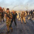 Iraqi security forces gather to advance towards the centre of Ramadi city, December 25, 2015.