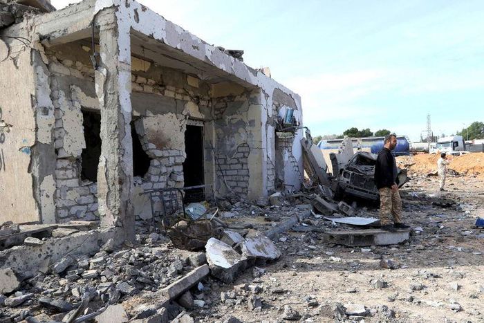 General view of damage at the scene of an explosion at the Mislattah checkpoint near Khoms, on the coast road between Tripoli and Misrata Libya November 24, 2015. REUTERS/Stringer
