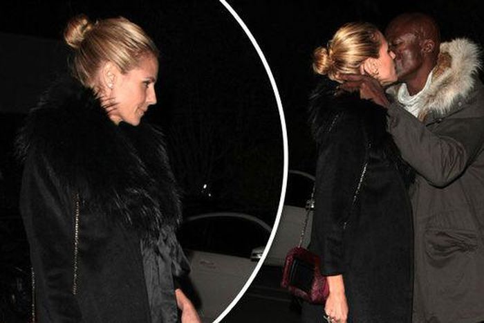 heidi klum sharing a kiss with seal.