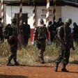 African and French peace keeping troops stand near a mass grave at a military camp in the 200 Villas neighbourhood of Bangui February 14, 2014.    REUTERS/Luc Gnago