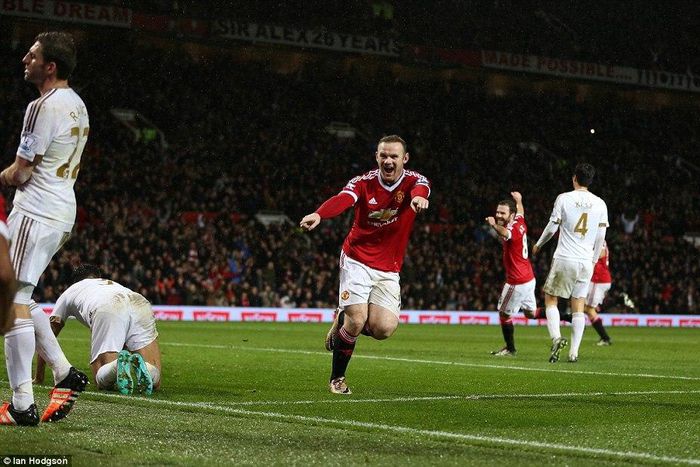 Wayne Rooney celebrates after scoring against Swansea