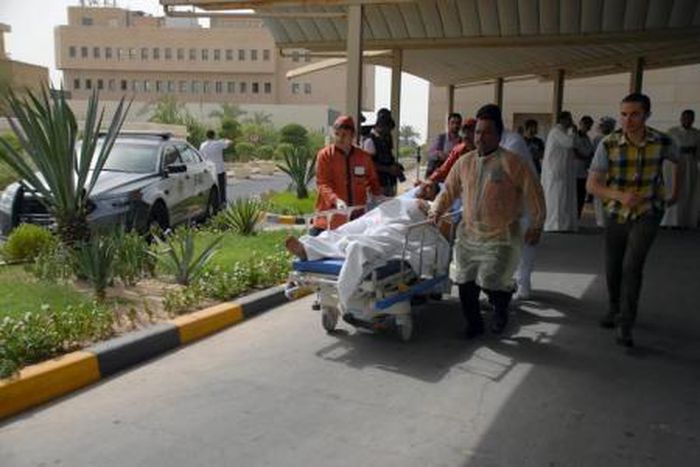 A victim of a suicide bomb attack at Imam al-Sadeq Mosque arrives at the Amiri hospital in Al Sharq, Kuwait City, June 26, 2015.