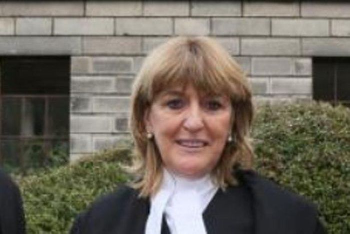 Justice Miriam Walsh