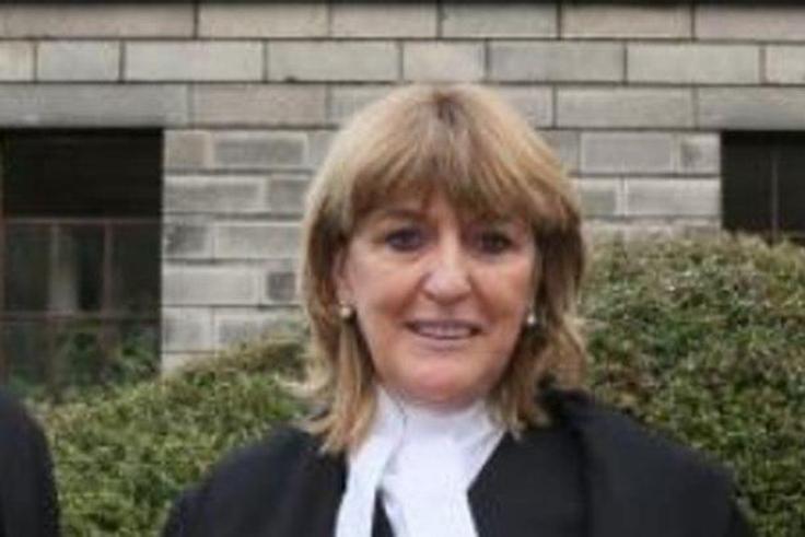 Justice Miriam Walsh