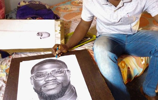 Eli Waduba with his drawing of Kevin Hart [Instagram/eliss_artss]