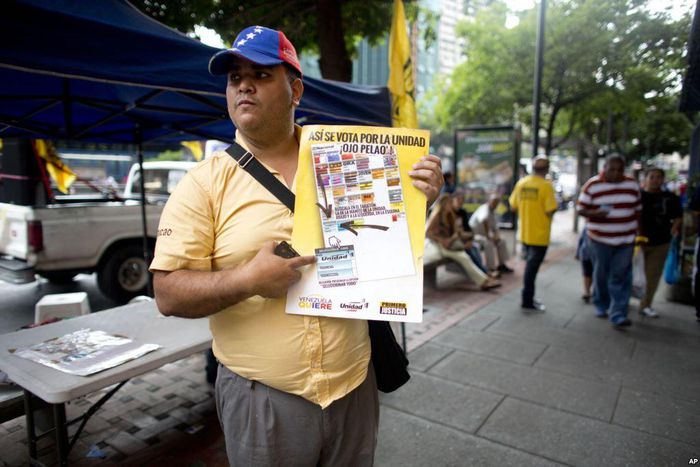 Venezuela says opposition activist killing was gang-related