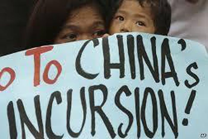 China angered as Filipino protesters visit South China Sea island