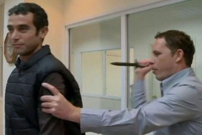 Reporter stabbed in the back after he volunteered to test a 'Knife-proof vest'