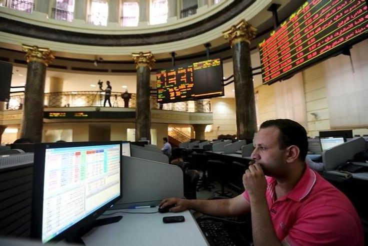 A trader works at the Egyptian stock exchange in Cairo, August 23, 2015. REUTERS/Mohamed Abd El Ghany