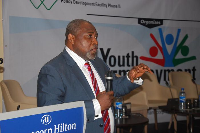 The Honourable Minister of State for Federal Ministry of Labour and Employment, James Ocholi (SAN), addressing participants of the Summit by UK Department for International Development (DFID) in Abuja
